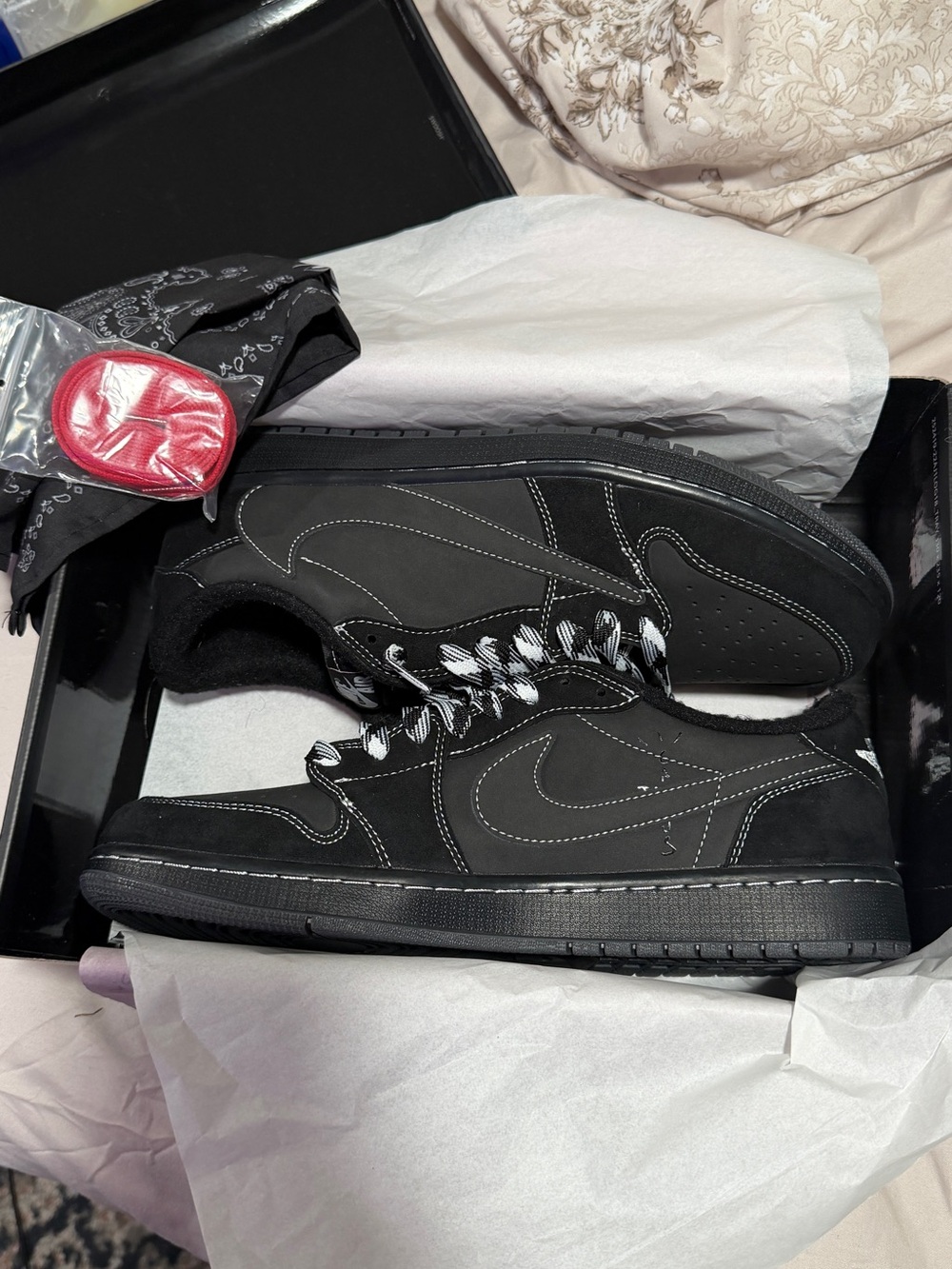 Travis Scott’s black phantom size 13